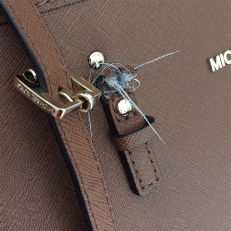 michael kors tasche riemen kaputt